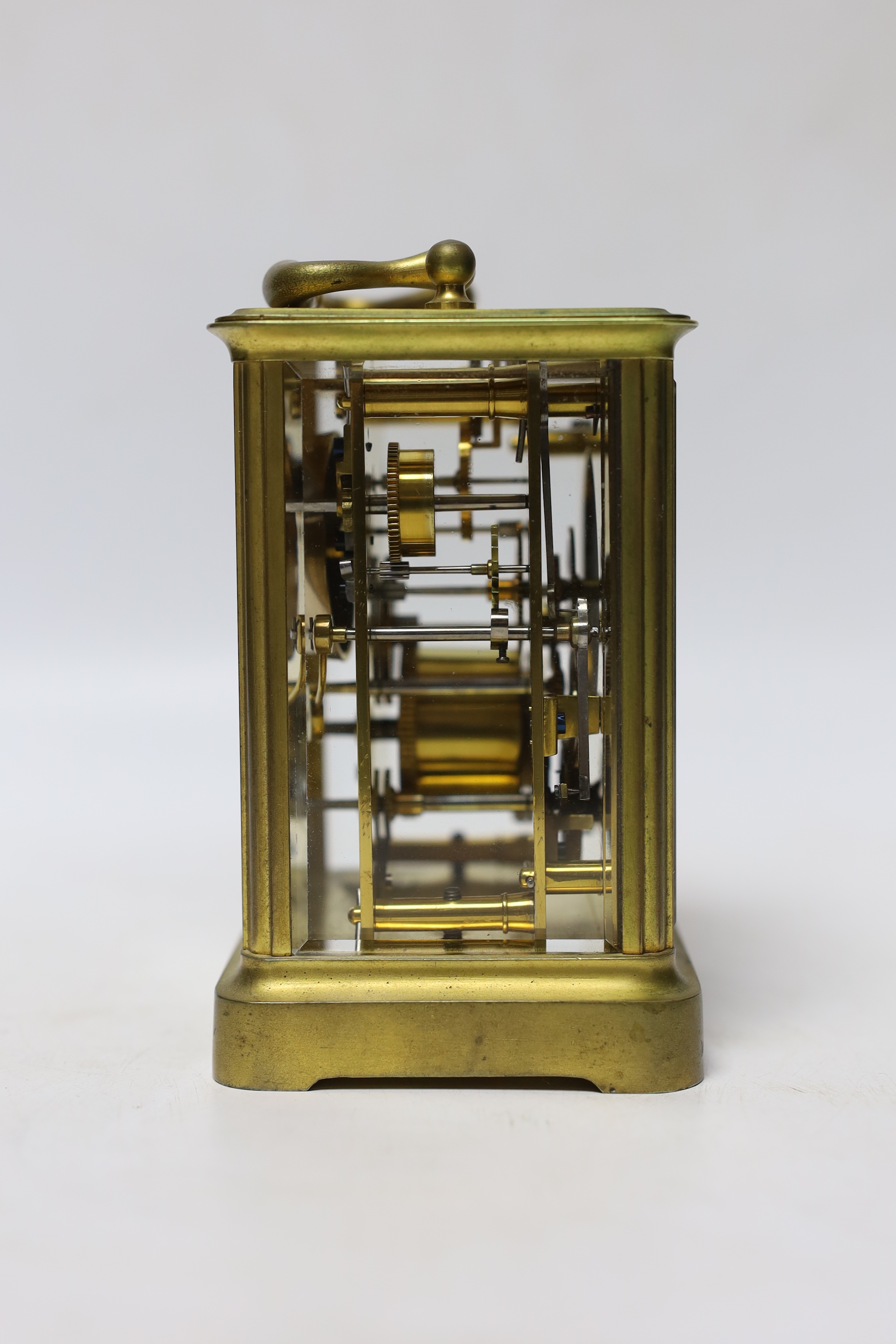 A French brass carriage clock striking on a bell, 12cm